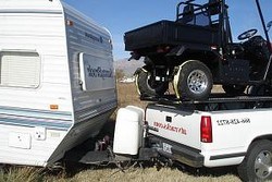 Hauling-Golf-Cart-and-Camper