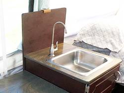 https://thecampingadvisor.com/wp-content/uploads/2021/11/How-To-Replace-a-Faucet-In-a-Pop-up-Camper-1.jpg