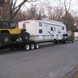 Truck-Camper-on-a-Flatbed-Trailer