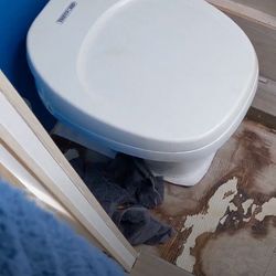 Dometic-310-Toilet-Leaking-Between-Bowl-And-Base