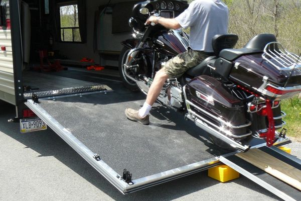 How-To-Load-a-Motorcycle-On-a-Trailer-(Toy-Hauler-Unload)